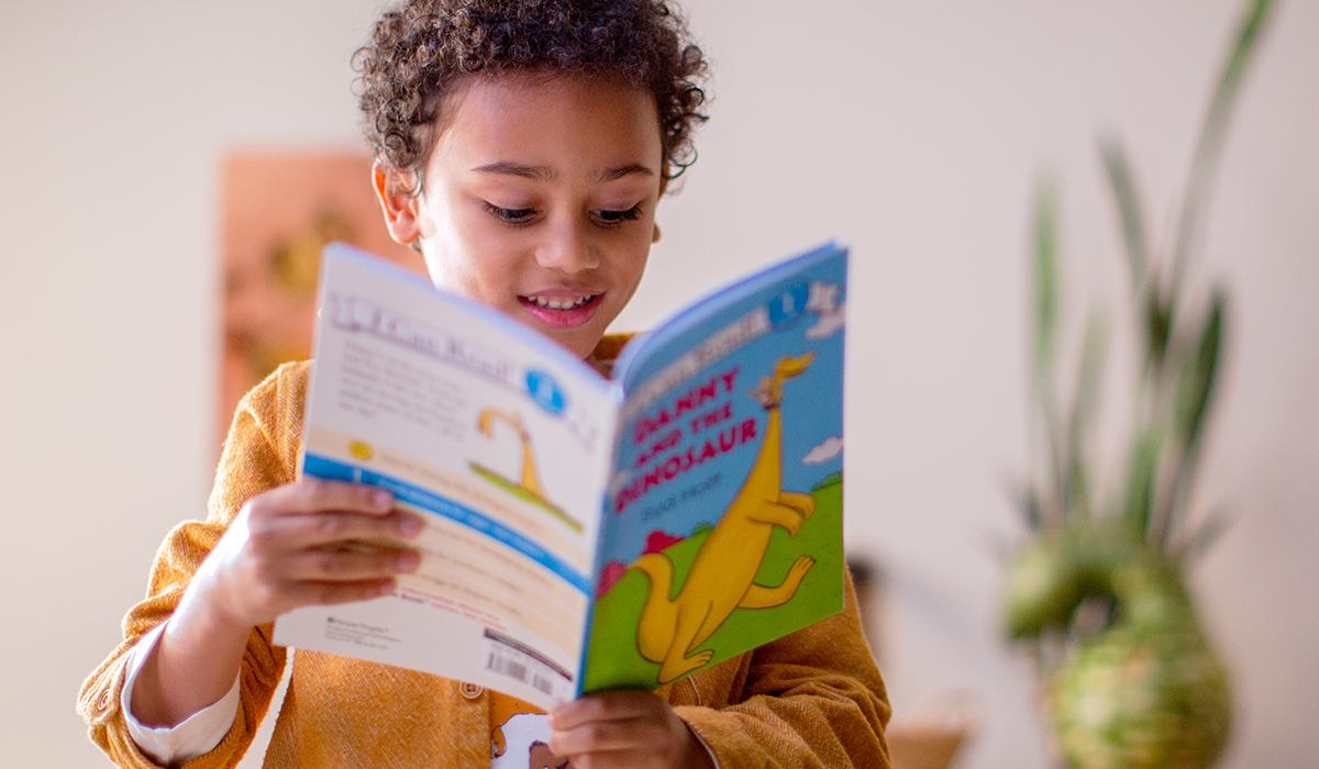 child reading a book